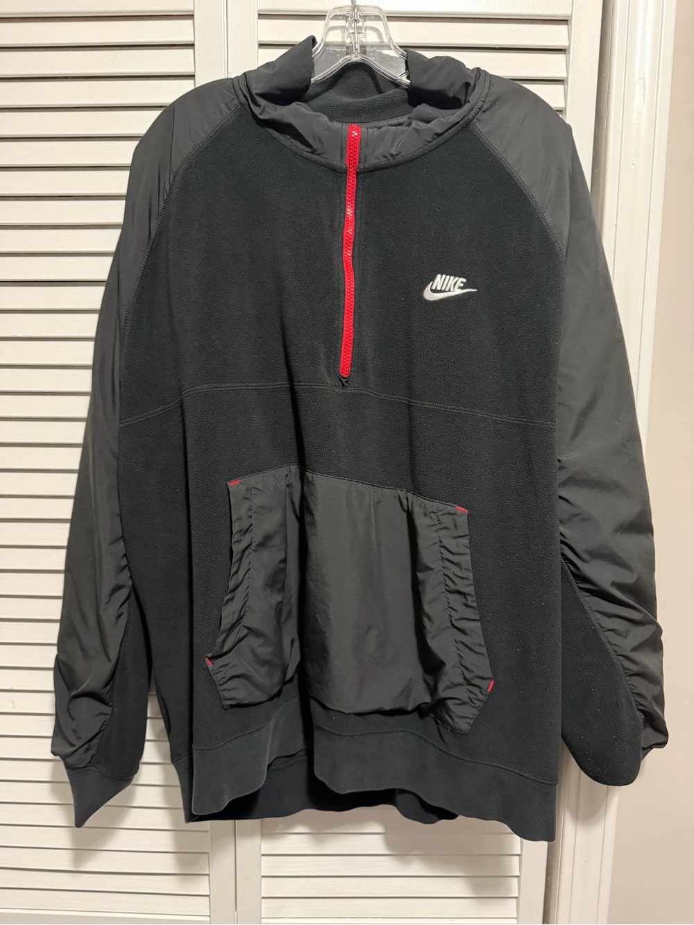 Nike Black Pullover Jacket with Red Zip Accent